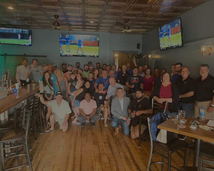 Chapter happy hour gathering at local restaurant